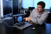 Stanford geophysicist Jesse Lawrence explains how low-cost seismic sensors could help create an early warning system for earthquakes. The Quake Catcher Network is a collaborative effort among five academic institutions and the US Geological Survey. (Photo: Steve Fyffe / Stanford News Service)