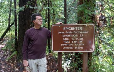 Greg Beroza standing at the epicenter of the Loma Prieta earthquake 
