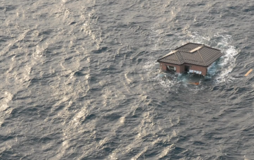 House surrounded by water