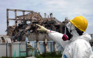 Fukushima power plant worker pointing his finger