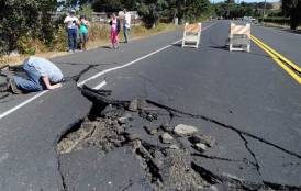 Crack in the road caused by seismic activity 