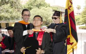 Boxiao Li receiving his PhD