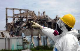 Fukushima power plant worker pointing his finger
