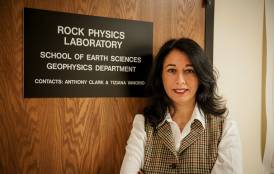 Tiziana Vanorio standing in front of the Rock Physics Laboratory 