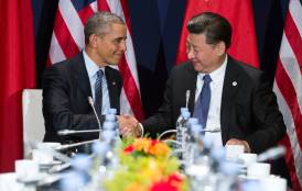 President Obama shakes hands with Chinese President Xi Jinping.
