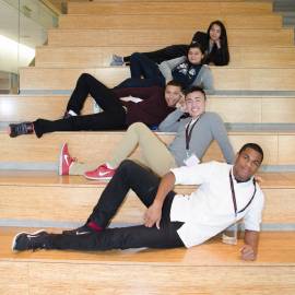 Contestants on stairs.