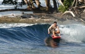Lecturer Dan Reineman surfing