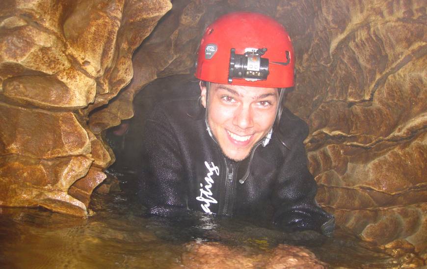 Student in cave
