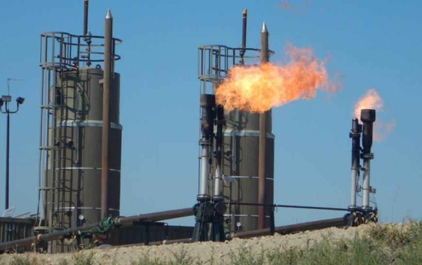 Carbon dioxide emitted from a natural gas flare at a North Dakota oil well